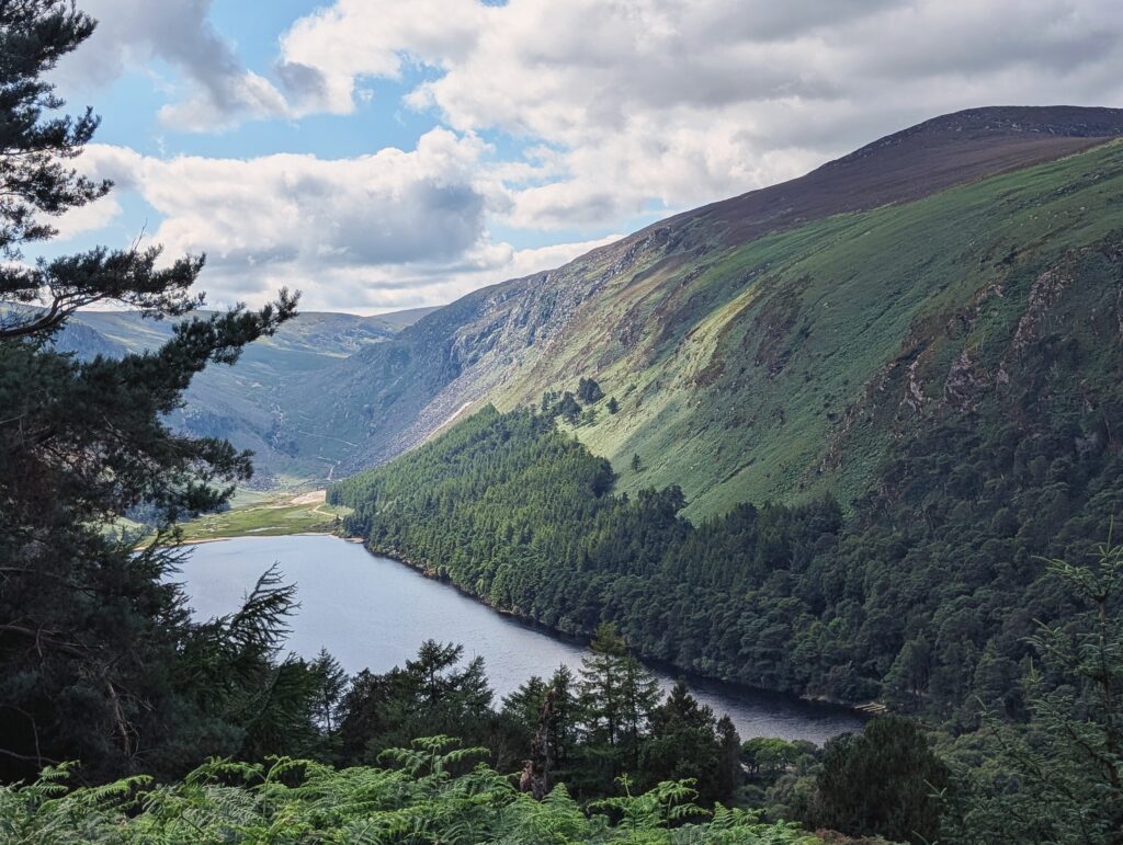 A picture of mountains and a lake.